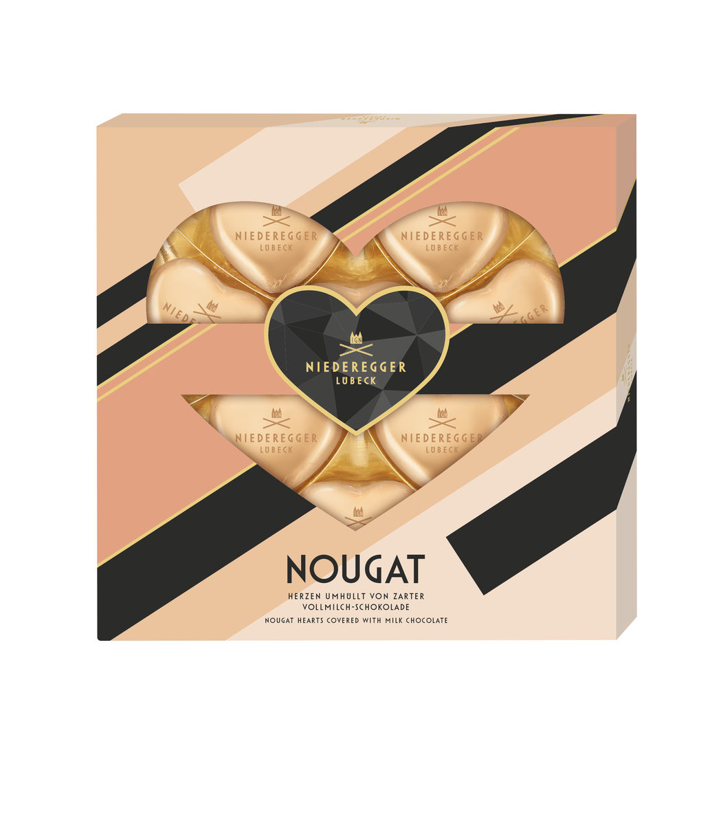Nougat Herzen Vollmilch-Schokolade 125 g Bild zeigt Nougat Herzen in 52% Vollmilch-Schokolade, 125 g, Herzform, Hauptbild.