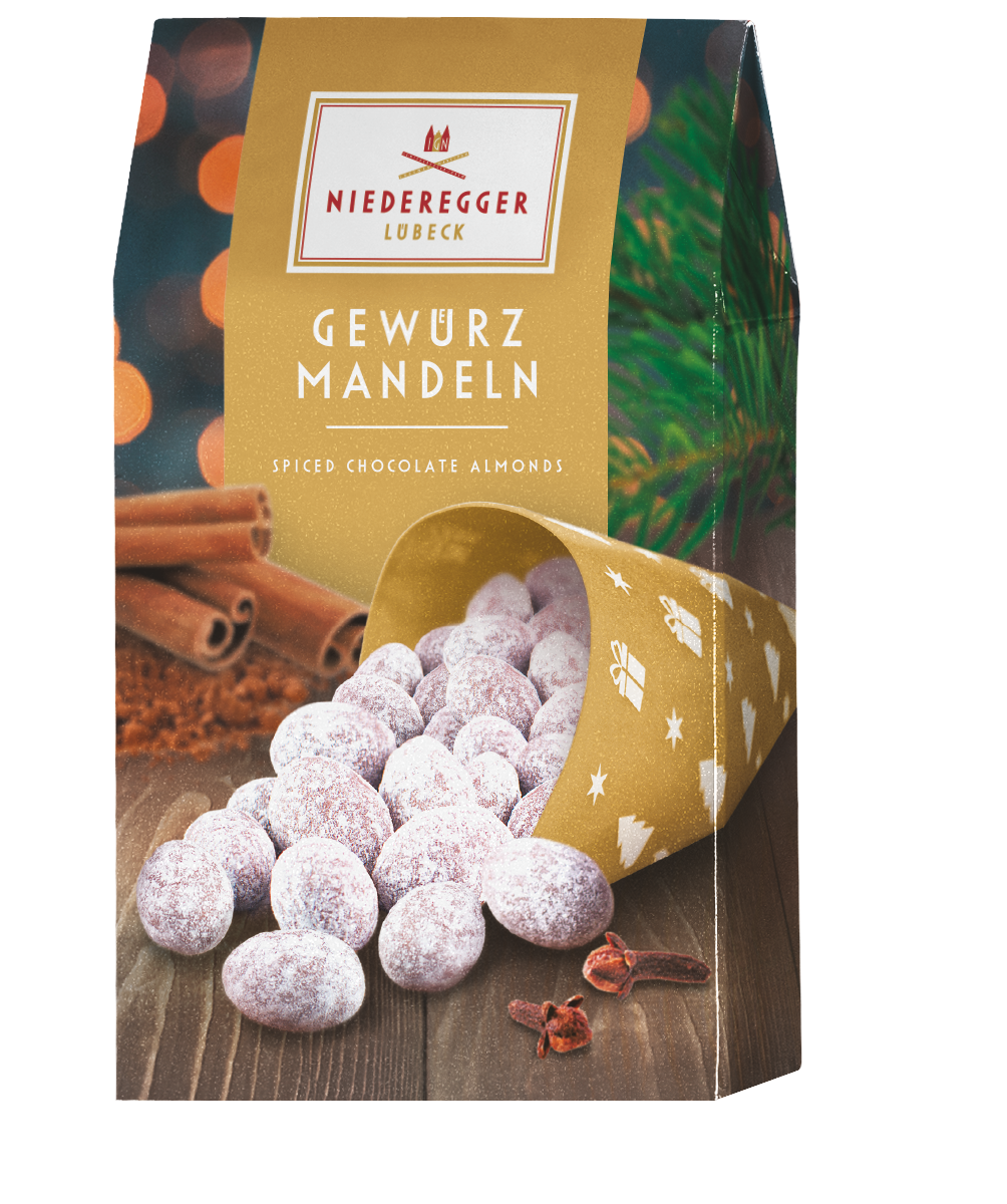 Gewürz-Mandeln, 100 g, Mandeln, Zucker, Kakaobutter, Vollmilchpulver, Magermilchpulver, Gewürze, Orangenschalen